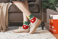 Vintage plaid socks, boasting festive hues of green and red, capture the essence of the season, with patterns reminiscent of the warmth.