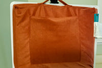 Back of MagDesk pocket and cushion.  With the pre-paid subscription of four puzzles you can receive a magnetic lap desk for free.