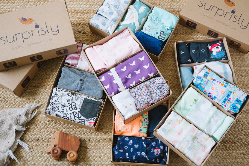 Surprisly boxes showing that each box has 3 unique outfits for little ones
