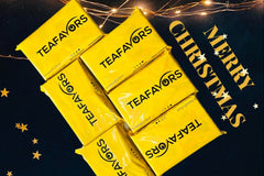 Colorful subscription box from TeaFavors featuring personalized tea blends and four premium tea packets including black and herbal teas