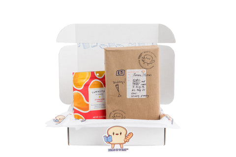 Read It & Eat Blind Date with a book.  Each box contains a food story, an artisanal snack, and a $5 donation to fight hunger in Buffalo, NY