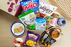assortment of Thai snacks in welcome box, including coconut, spicy snacks and more. Best value and premium quality snacks