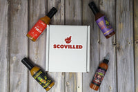 SCOVILLED subscription box featuring FAIYA, Up All Night Bottling Co., Down to Ferment, Sam Sa'house.