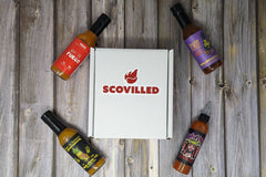 SCOVILLED subscription box featuring FAIYA, Up All Night Bottling Co., Down to Ferment, Sam Sa'house.