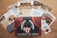 The Conundrum Box displays game cards, props, and themed materials for an engaging escape room experience