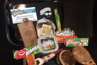 Loaded n' Rollin' by Dank Box showcases various smoking accessories in a wooden subscription box