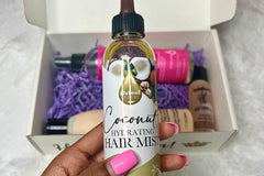 A close-up of Difeel's Coconut Hydrating Hair Mist featured in Her Crown and Glory Subscription Box 