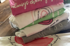 Our tees are so colorful and so much fun.  Each month is different and sure to bring you JOY.  Join our club today and get them! 