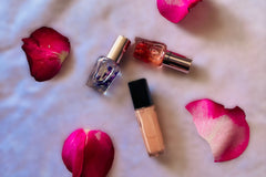 featured items nail polish and cuticle oil with rose petals