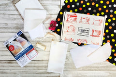 This member box included a pre-cut sewing project kit to make a pair of reusable produce bags. Also, thread, extra fabric, pins, and more.