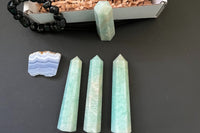 Amazonite faceted standing wand. 
Amazonite is known as the stone of Hope.
The wands are 3 inches tall and 1/2 inches wide.