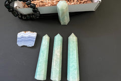 Amazonite faceted standing wand. 
Amazonite is known as the stone of Hope.
The wands are 3 inches tall and 1/2 inches wide.