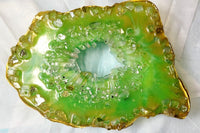 A vibrant green resin art piece with crystal accents, featured in The Joy of Resin Art subscription box