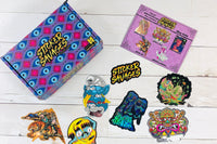 Colorful assortment of stickers from the Monthly Sticker Savages Box featuring monsters and whimsical designs for water bottle stickers