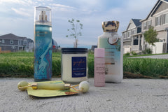various bath and body works products, jade roller, peel of mask and bath and body works gigham candle.