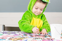 Seasonal kids coloring tablecloths; fun, themed designs delivered monthly for creative playtime all year long. Made in the USA