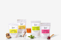 A variety of Everyday People Coffee & Tea's Great Tasting Sustainably Grown and Ethically Sourced Loose Leaf Tea Subscription, perfect for gifting, on a white background.