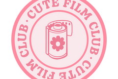 The Cute Film Club logo.  A pink circle with the image of a film roll with a flower on it, surrounded by the club name