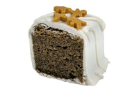Close-up image of the Gingerbread Blondie Bite. This bite is our gingerbread blondie dipped in white chocolate and topped with sprinkles.