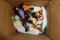 You get seven different Disney PVC figures in every cake toppers subscription box from Whatsits Galore