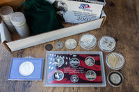 Coin Collector's Box image with coin samples, box, collector's set, and more. Each box comes with silver coins up to 1 oz. 