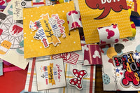 This is a photo of an assortment of Pixie Dusting slap bracelets to give out at the parks, use as party favors or gift to your friends. 