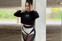 Glam Luxe Box Item- Signature cropped hoodie, white and black high waste leggings, displayed with a glam style.