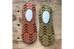 Mustard yellow & Burnt Orange, with black and outlined black arrows no-show socks. Super comfortable socks you will always grab.