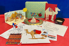 Egyptian Wiggle Worms Kits Learning through play. Picture includes scene, camel & Egyptian necklace craft, sensory sand writing, & more.