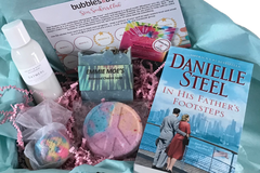 Bubbles & Books subscription box featuring a romantic novel, handmade soap, and bath products for relaxation
