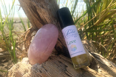 Positive Psychology based, Sacred Strengths Love Aromatherapy roll made with organic essential oils and Rose Quartz Palm Stone.