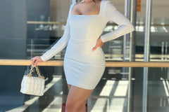 Glam Luxe Box fashion piece and handbag. White bodycon mini dress with a square neckline and a gold chain purse.