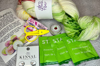 September 2023 box--You can always expect a carefully curated box with great yarn and 3-4 fun notions with a tea sampler.