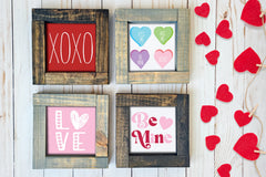 Brown and gray wood framed signs in various designs. Valentine's day xoxo, candy conversation hearts, be mine.