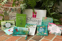 Bette's Box of Blessings subscription box featuring faith-themed items, including devotionals, cards, and inspirational gifts