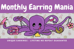 Colorful assortment of unique earrings including food and whimsical designs in the Monthly Earring Mania subscription box