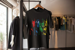 Avengers Tshirt hanging on a rack in a boutique shop. It features Iron Man, Captain America, The Hulk, and Thor.