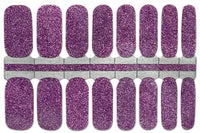 A complete set of Amethyst Nail Wraps including 16 nail polish stickers. A bright purple glitter color.