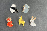 Love animals? Love origami? Look no further. These pins are your lovable critters (panda, fox, koala, but in origami form! 