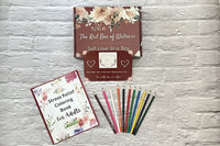 The Stress Relief Adult Coloring Book Box will include a book, an adult coloring book, colored pencils, as well as 2 - 3 self-care products.