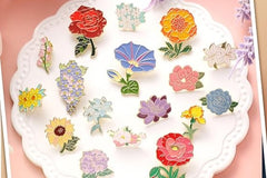 These pins are all beautiful flowers of all types. Think of your favorite flower, I bet we have it in stock! 