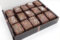Nettie's Craft Brownies rainbow cookies sprinkles chocolate dipped side view of fifteen cookies in box
