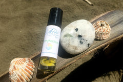 Positive Psychology based, Sacred Strengths Compassion Aromatherapy roll made with organic essential oils.