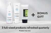 Full-sized cleanser, moisturizer, suncare products standing up with a + Bonus Gift text next to to them.