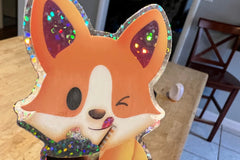 Example sticker of glitter dog coffee sticker that could make an appearance in a future sticker club!