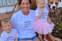 Our first and still a favorite of all customers. Simple white tee with our inspirational message. Always choose joy.