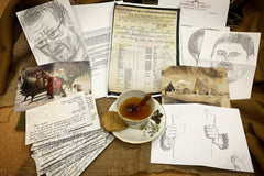 This box shows a number of letters, sketches and vintage christmas cards and postcards as well as a cup of chai tea