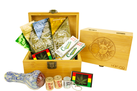 A Hakuna Supply subscription box filled with eco-friendly stone bundles including rolling papers, hemp wick rolls and more.