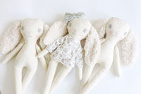 Exclusive Subscription of two handmade fabric dolls for children.