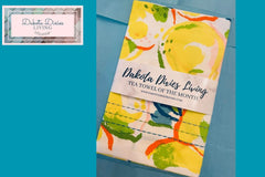 Colorful summer towel with yellow lemons.